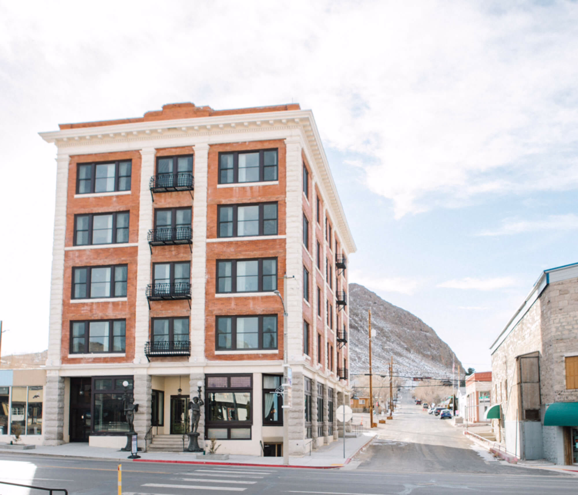 The Belvada Hotel building in Tonopah, Nevada, with refreshed historic architecture overlooking a quiet desert town street