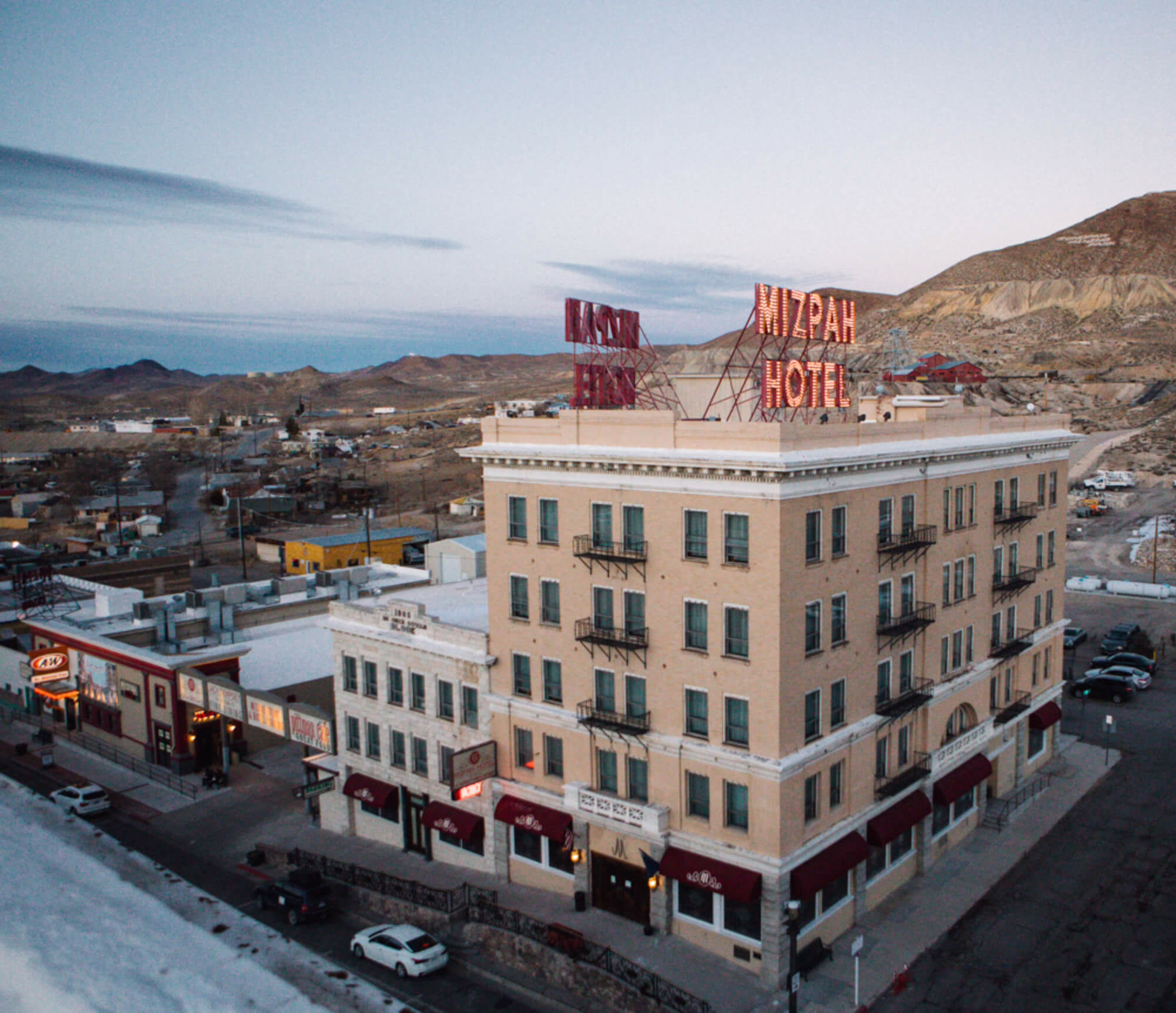 The Mizpah Hotel building in Tonopah, Nevada, with vintage rooftop signage overlooking a high desert town setting
